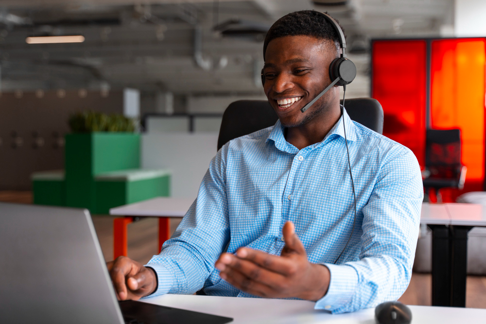 A young professional working confidently at a laptop