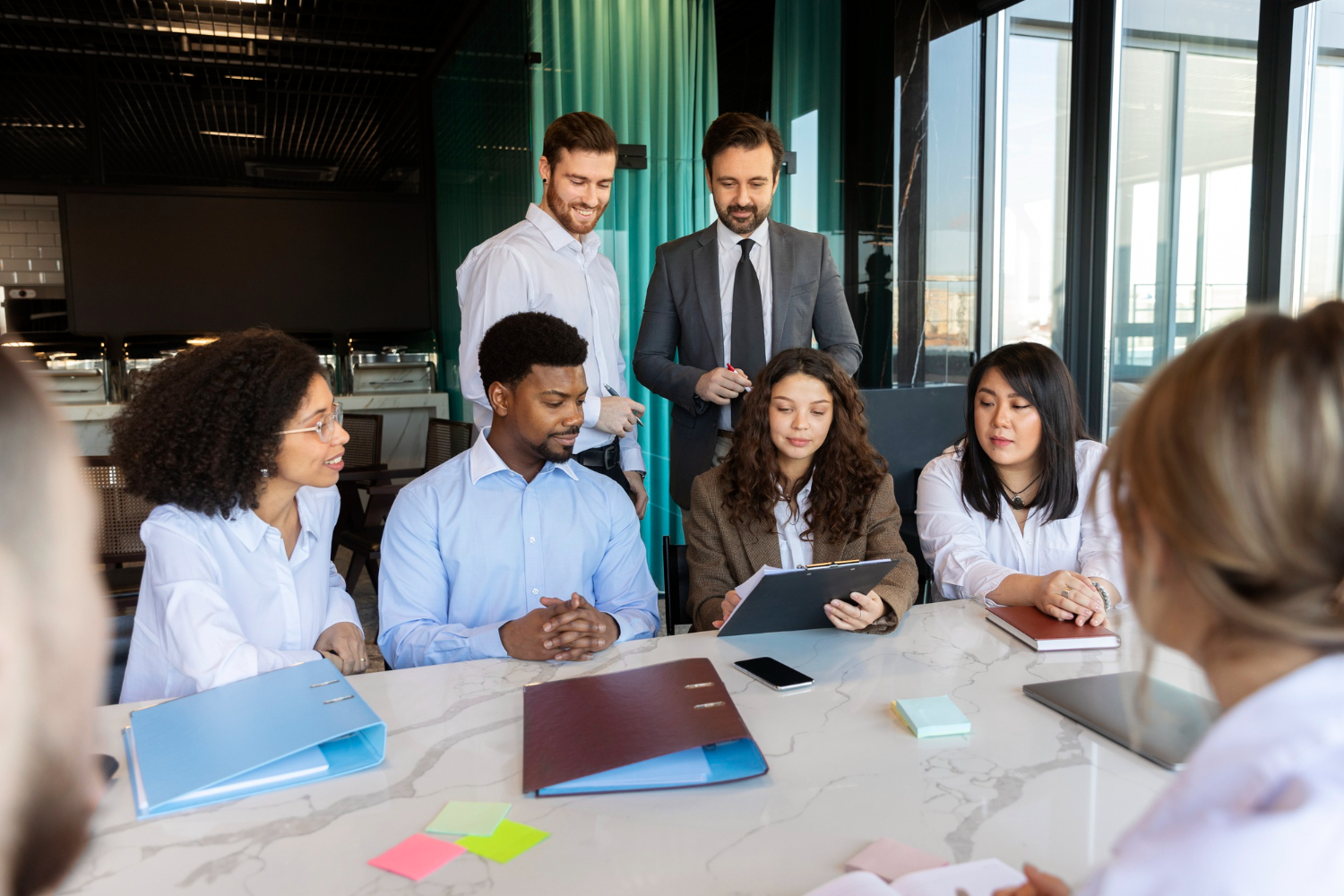 A senior leader guiding a boardroom team